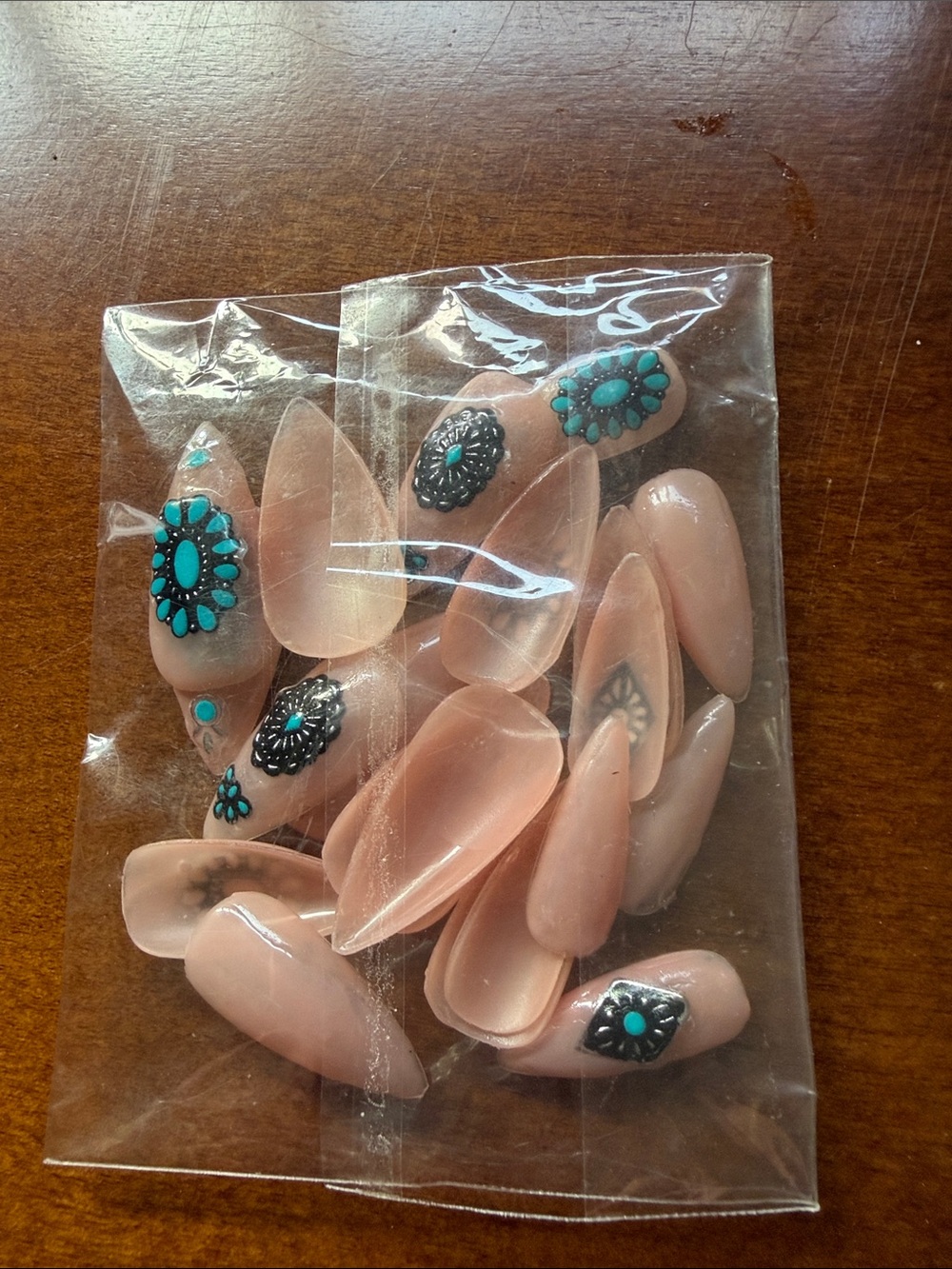 Blush Pink Stiletto Press-On Nails with Turquoise Floral Accents -